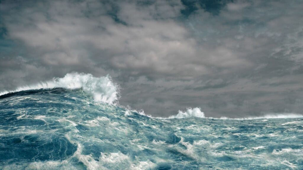(alt="A stormy ocean depicting the global megatrends and force that shape our world")